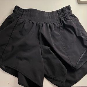 Lululemon black hotty hots in size 2, 4 inch inseam.